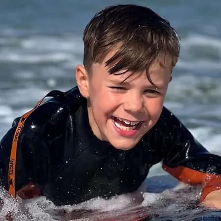 A photo of Raff smiling at the beach
