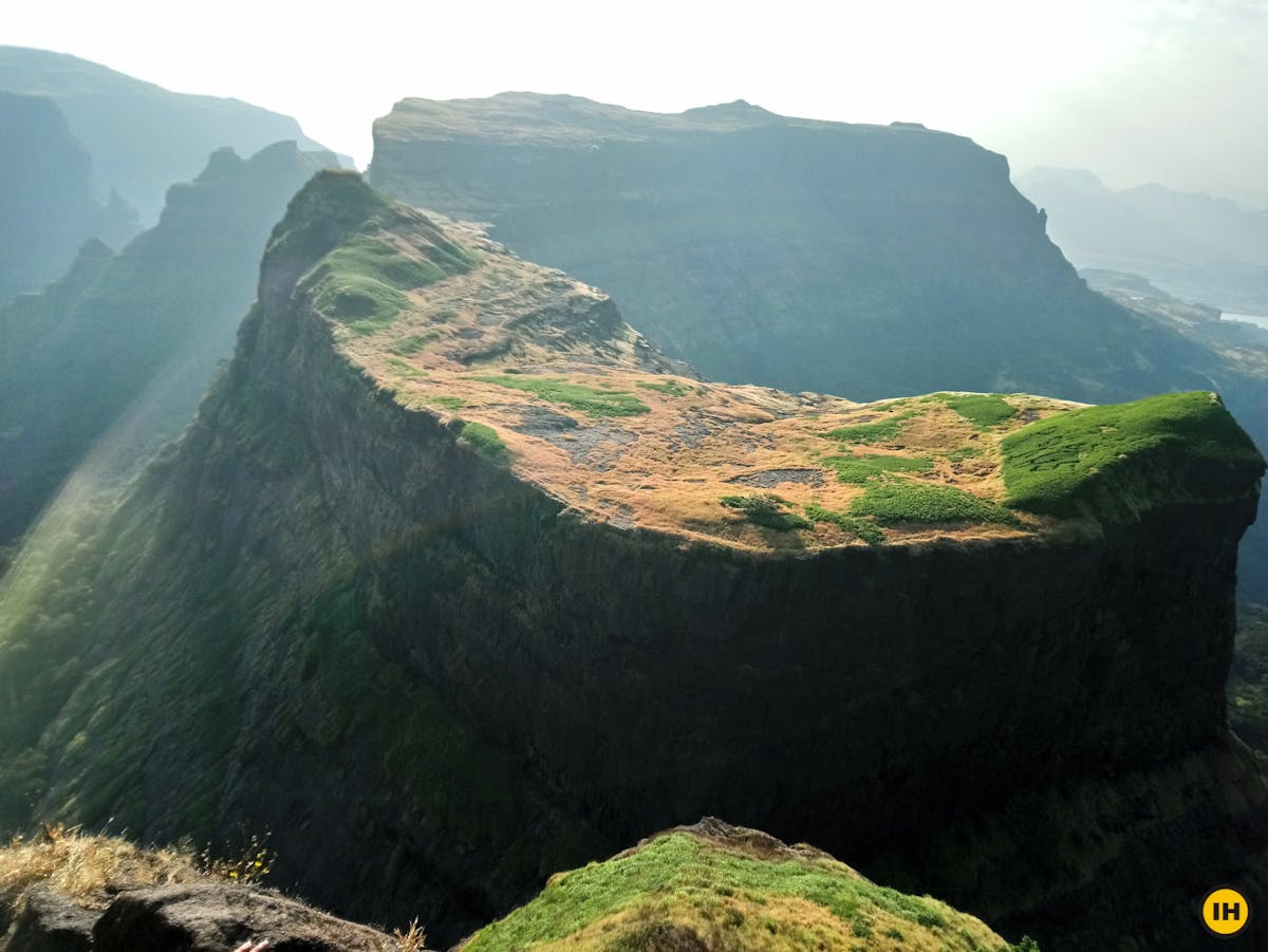 AMK Trek - The vast landscape of Alang fort greets you as soon as you reach the top of Madangad - Indiahikes - Nitesh Kumar