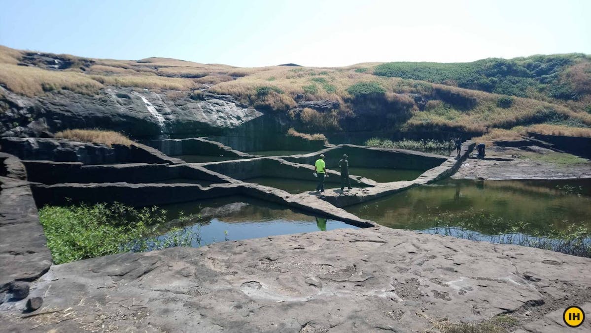 AMK Trek - The waffle-shaped water cistern on the top of Alang fort - Indiahikes - Nitesh Kumar