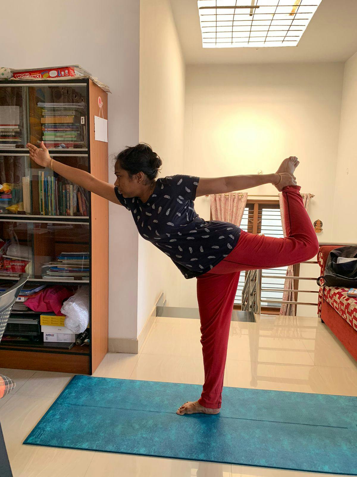 Nandini doing yoga poses 