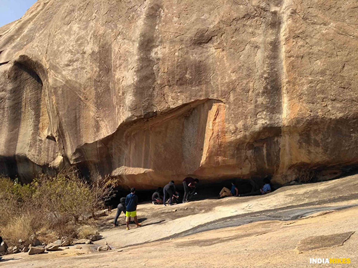 Students explore and have fun near the openings of the boulder. Picture by Venkat Ganesh