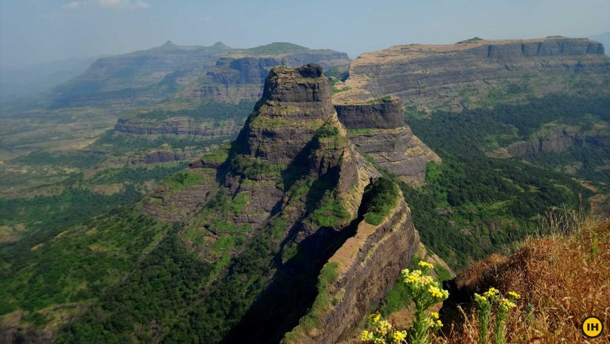 AMK Trek - Alang and Madan forts from left to right pan out in a panoramic sweep - Indiahikes - Nitesh Kumar
