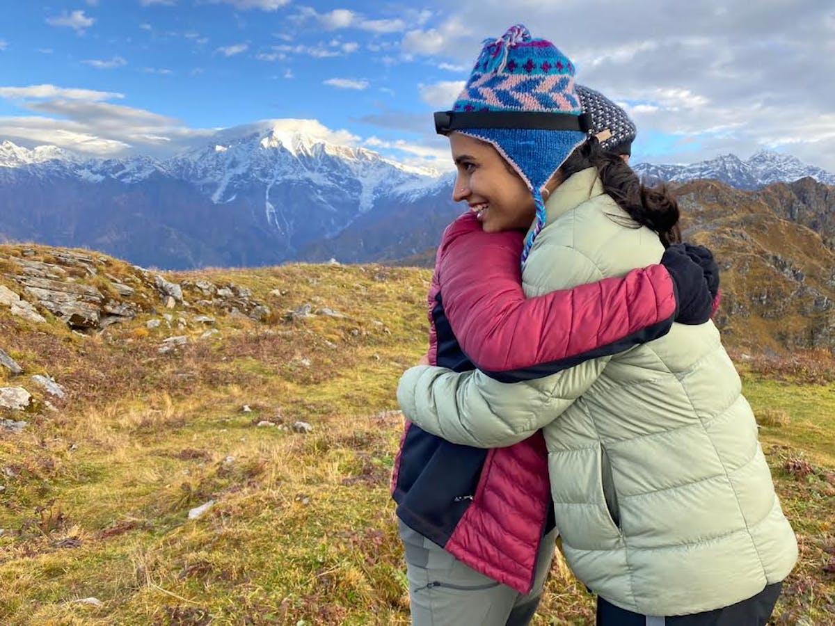 Navya hugging the trek leader in gratitude