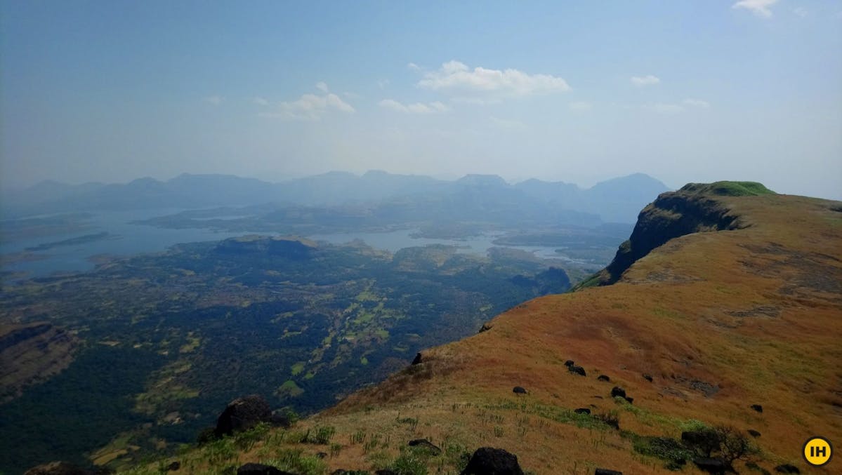 AMK Trek - Notice the surrounding peaks and reservoirs from the Southern edge of Alang fort - Indiahikes - Nitesh Kumar