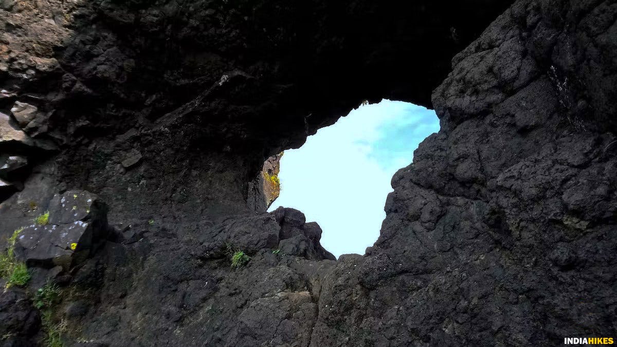 Natural hole on the wall of Suvela Machi, Rajgad Fort, Treks near Pune, Sahyadri treks, Trekking in Maharashtra, Indiahikes