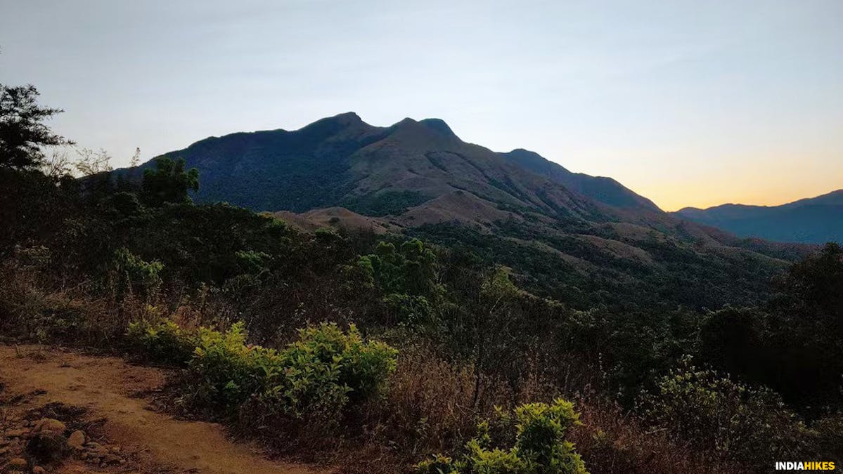 First glimpse of Shesha Parvatha, Kumara Parvatha, Indiahikes, Western Ghats treks, Karnataka treks, treks in Karnataka, most difficult trek in the western ghats of Karnataka