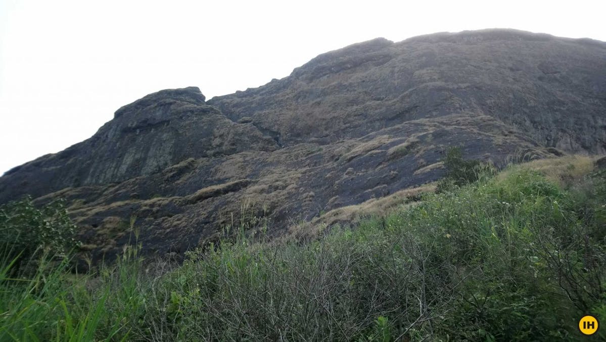AMK Trek - View of the rock-cut steps to Kulang fort. Picture taken from the ridge - Indiahikes - Nitesh Kumar