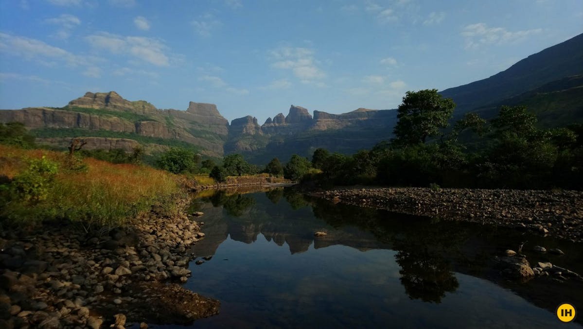 AMK Trek - The stream that separates farmlands and forest - Indiahikes - Nitesh Kumar