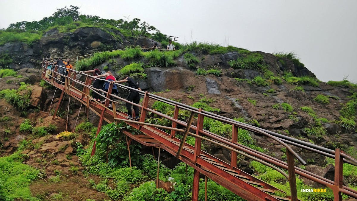 Narrow iron ladders, Kalsubai Peak Trek, Indiahikes, Treks near Mumbai, highest peak in Maharashtra,treks near Pune, Famous treks in Maharashtra, Sahyadri treks