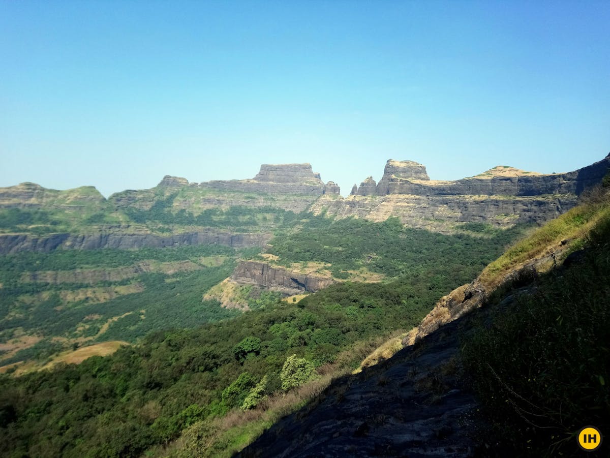 AMK Trek - You see the edge of Alang fort to the North, then Madan and Kulang forts further ahead - Indiahikes - Nitesh Kumar