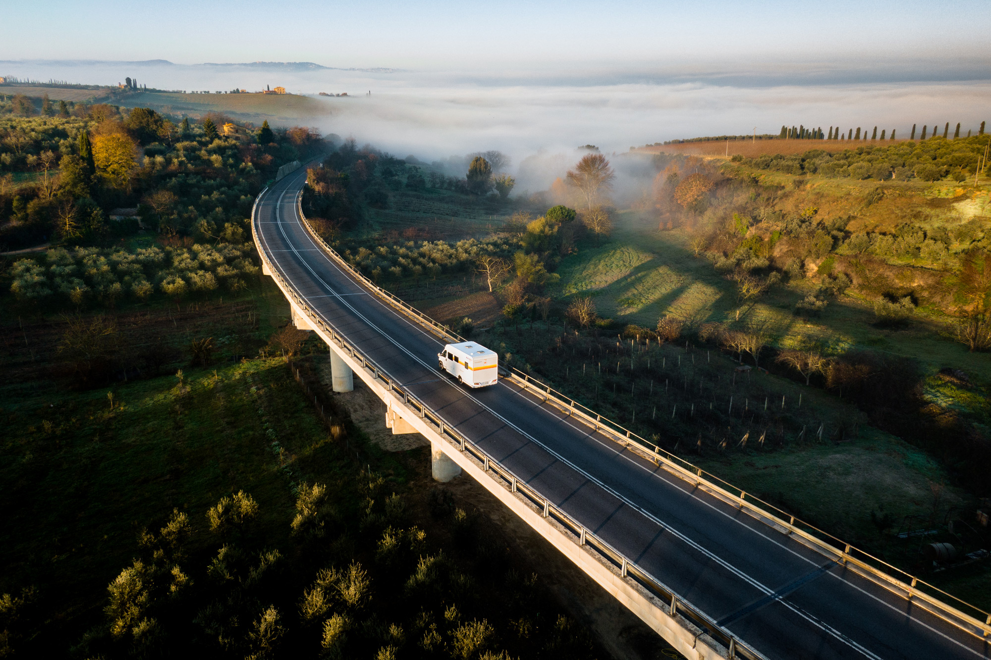 Camper van driving in a highway