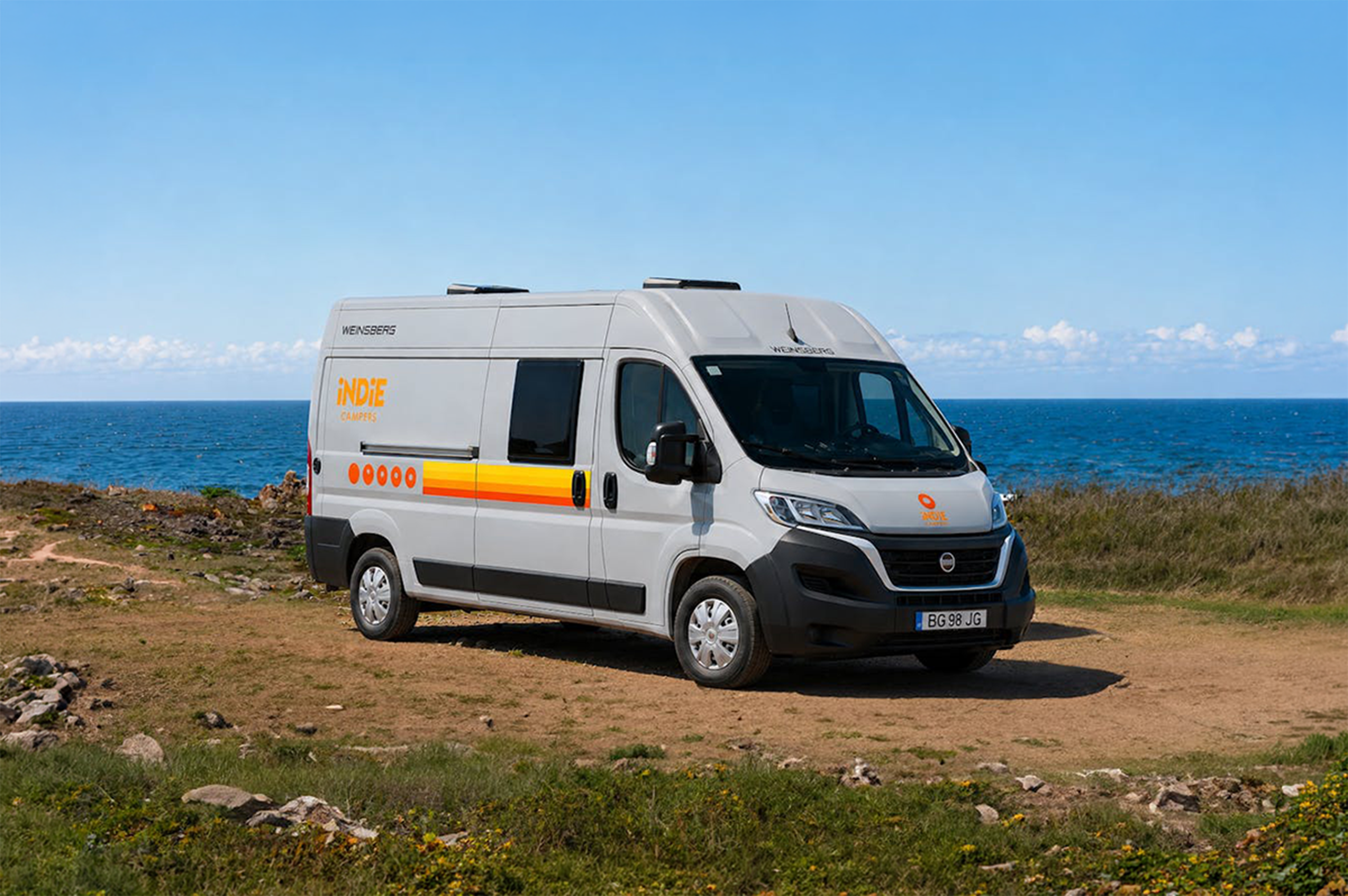 Large camper van, front and side view, standard roof, sliding side door, no roof tent visible.