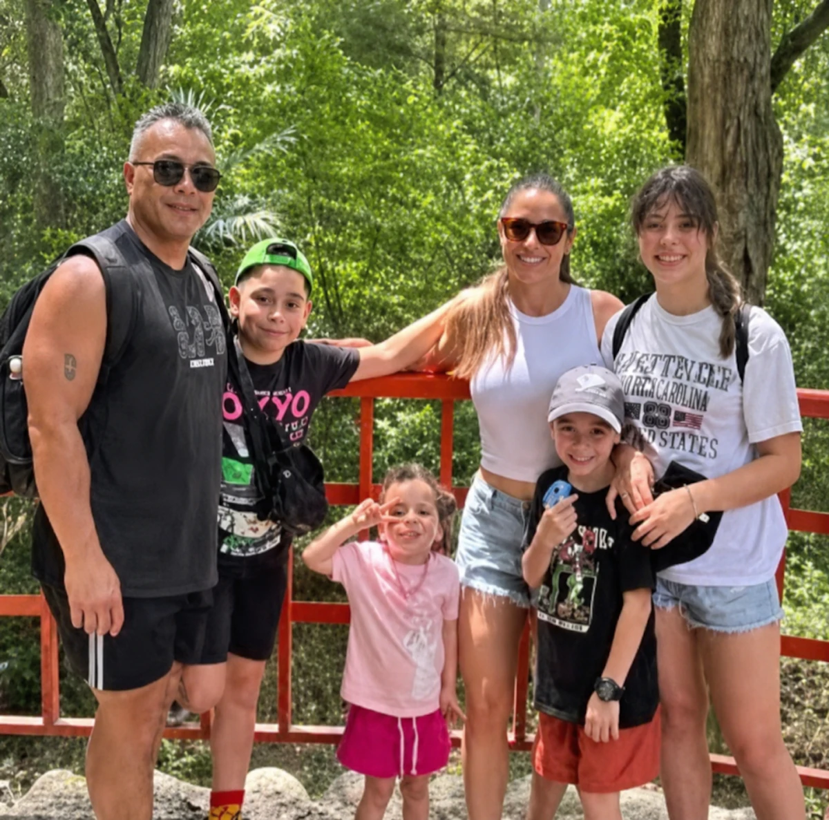 Kacey and Lene Inu with their four children. The family shifted from reactive spending to long-term financial planning after working with Infinity Group.