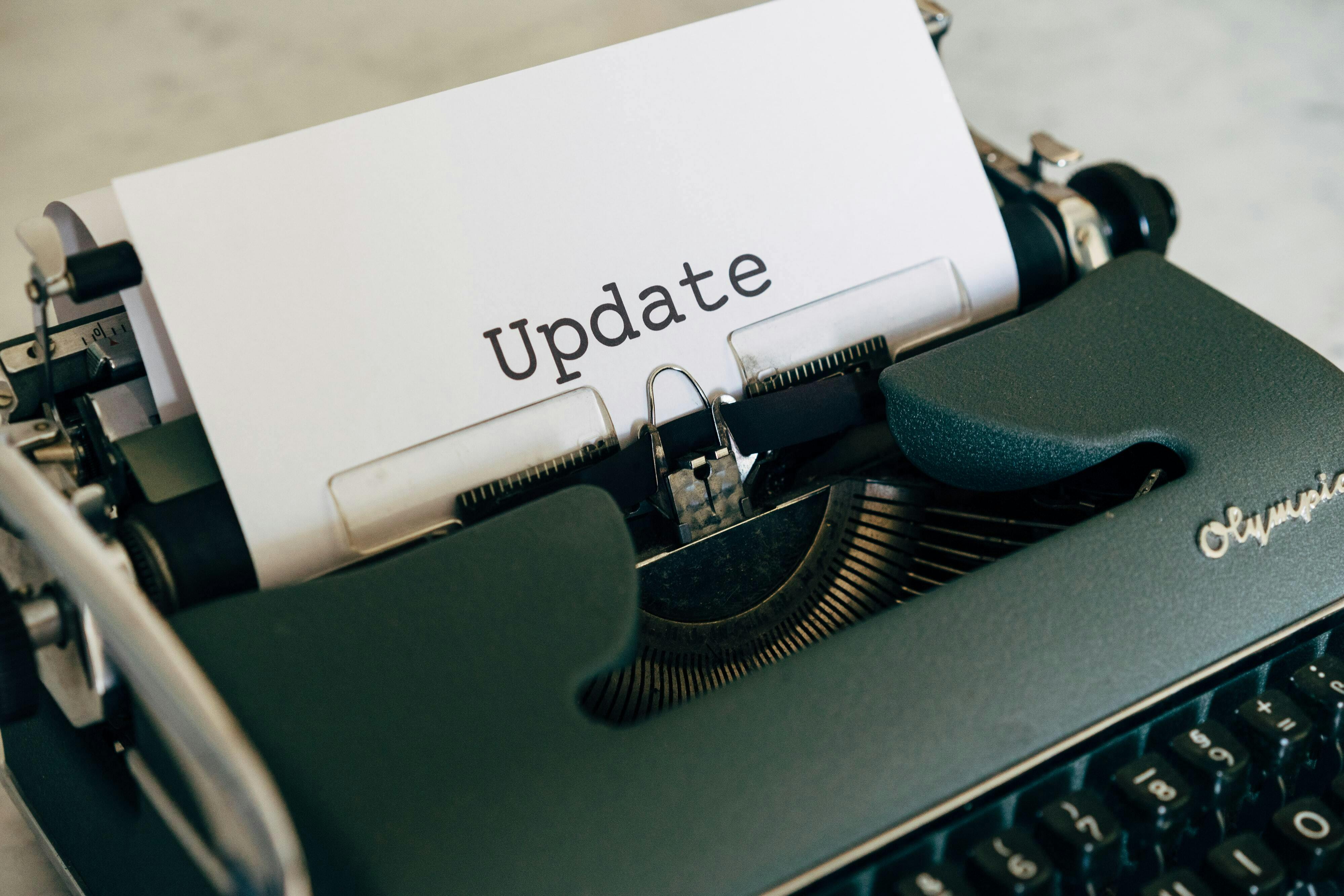 Typewriter with the word update