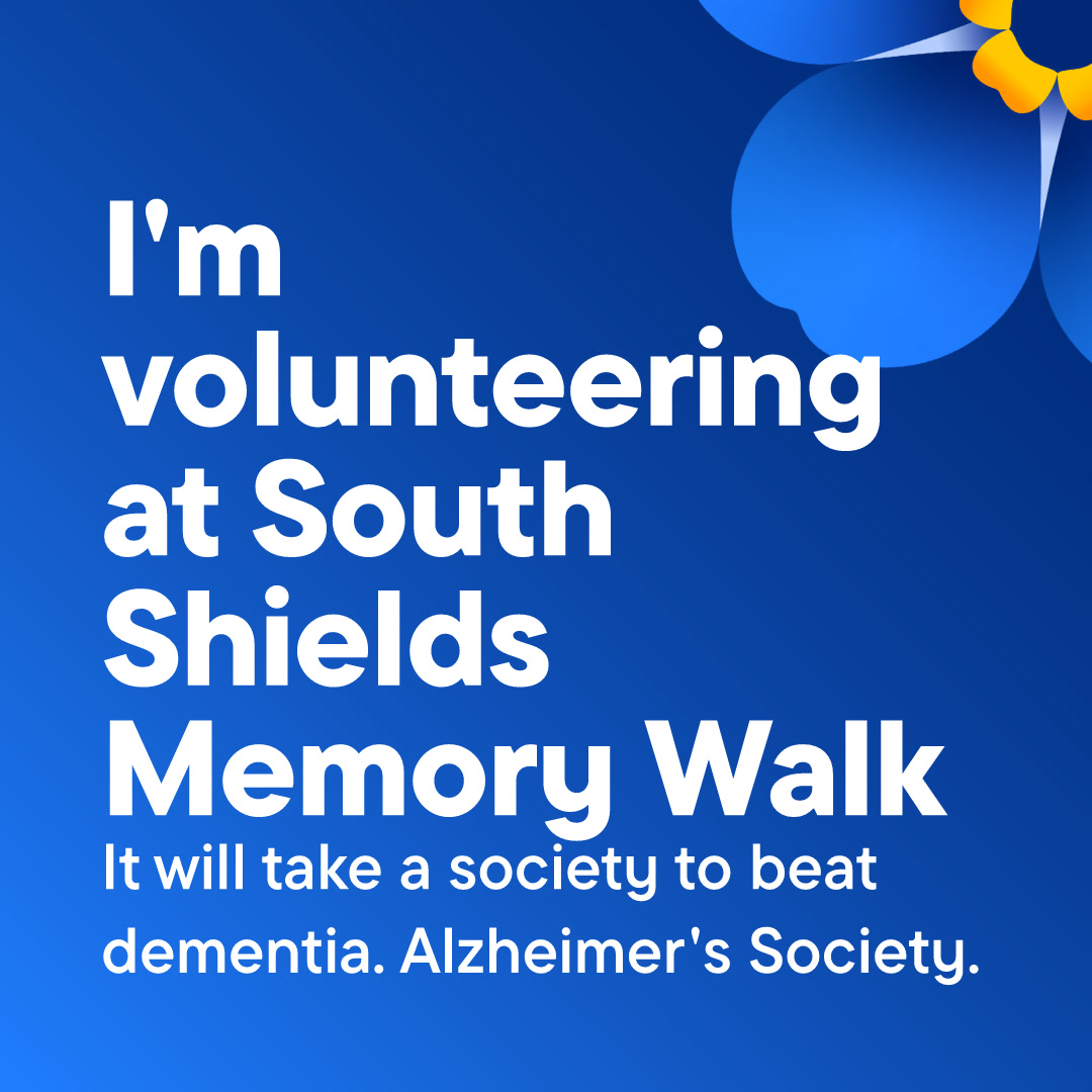 Blue background with white text that reads 'I'm volunteering at South Shields Memory Walk', with a forget-me-not flower in the top right corner.