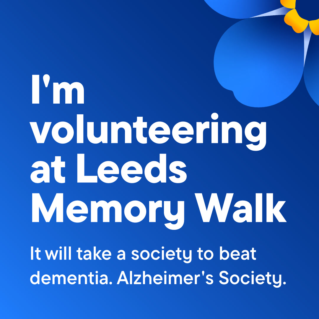 Blue background with white text that reads 'I'm volunteering at Leeds Memory Walk', with a forget-me-not flower in the top right corner.