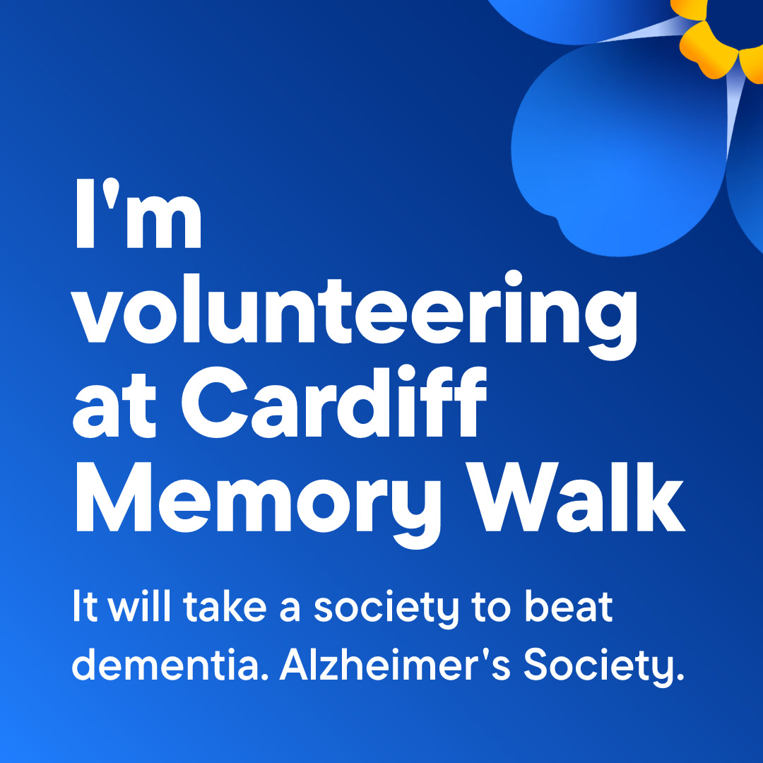 Blue background with white text that reads 'I'm volunteering at Cardiff Memory Walk', with a forget-me-not flower in the top right corner.