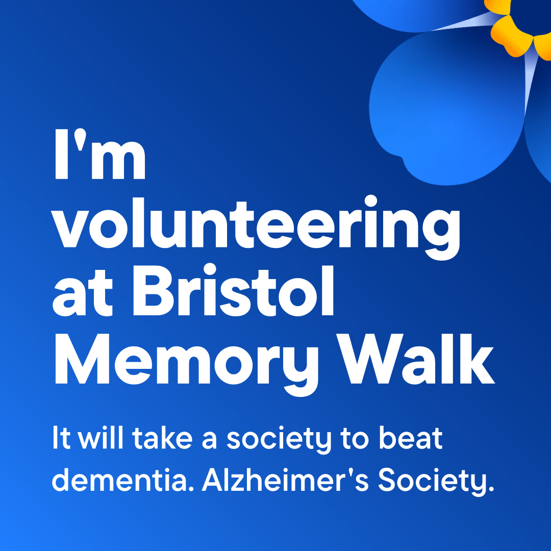 Blue background with white text that reads 'I'm volunteering at Bristol Memory Walk', with a forget-me-not flower in the top right corner.