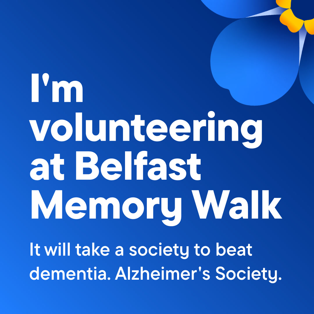 Blue background with white text that reads 'I'm volunteering at Belfast Memory Walk', with a forget-me-not flower in the top right corner.