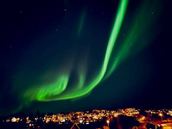 Northern Lights over Reykjavík taken with an iPhone. 