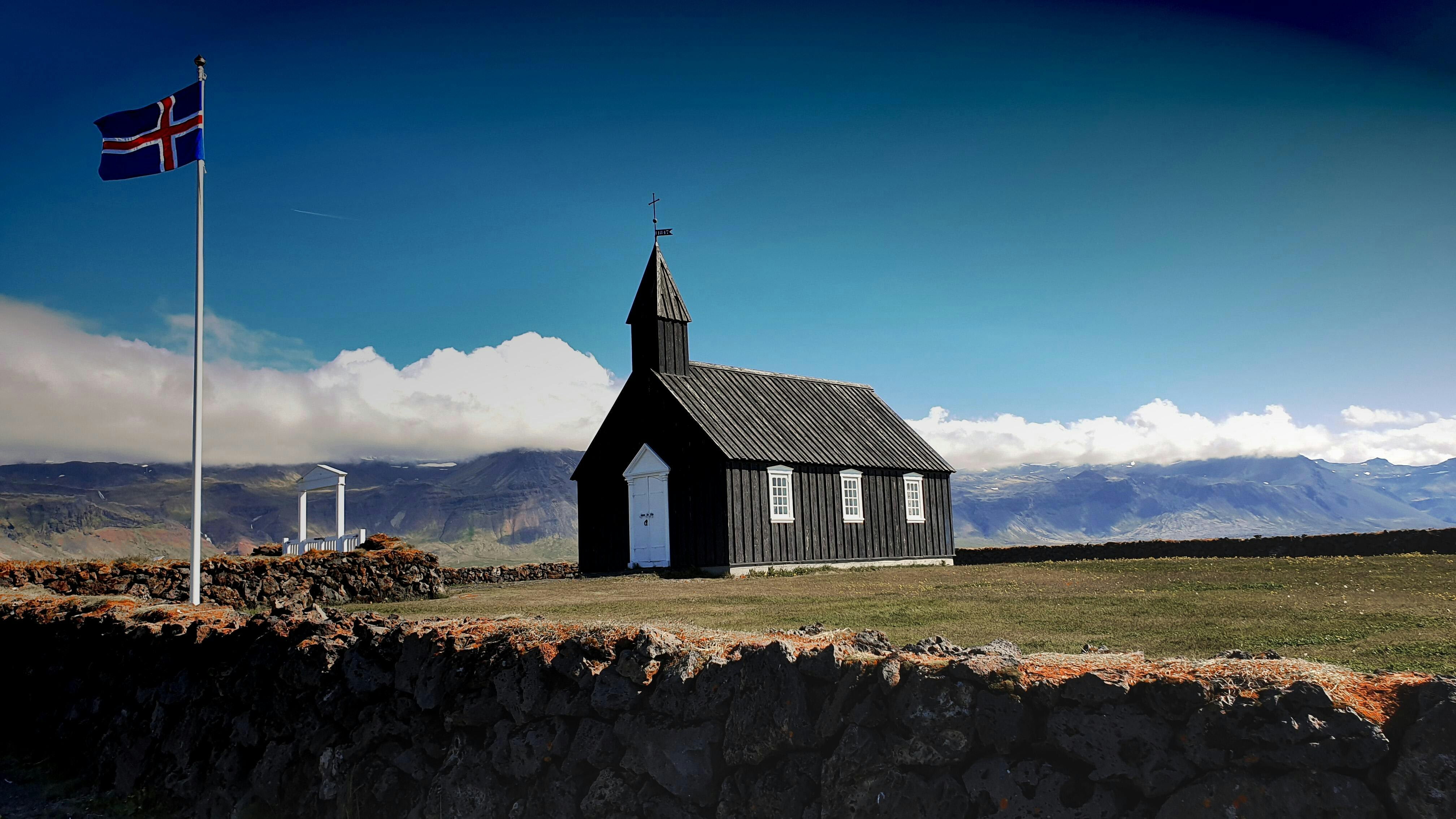 Búðir church with the Icelandic flag
