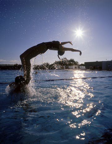Kids splashing around in one of Reykjavík's 17 geothermal swimming pools that are open year-round. 