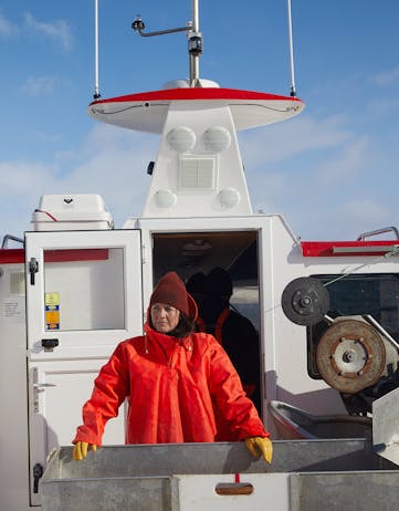 Fisherwoman working in Iceland