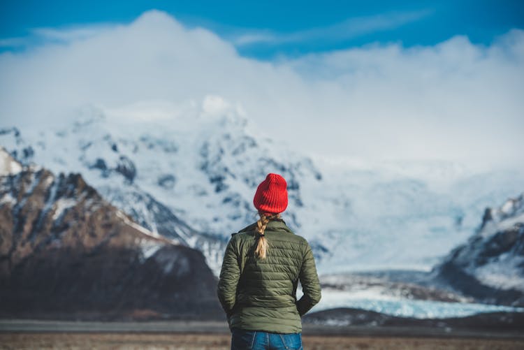 A traveller enjoying a mountainous view