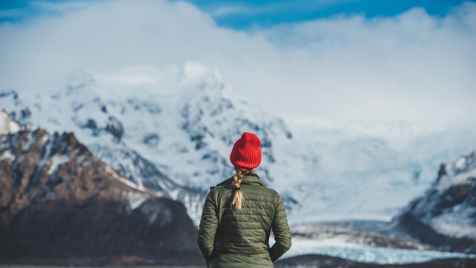 A traveler enjoying a mountainous view