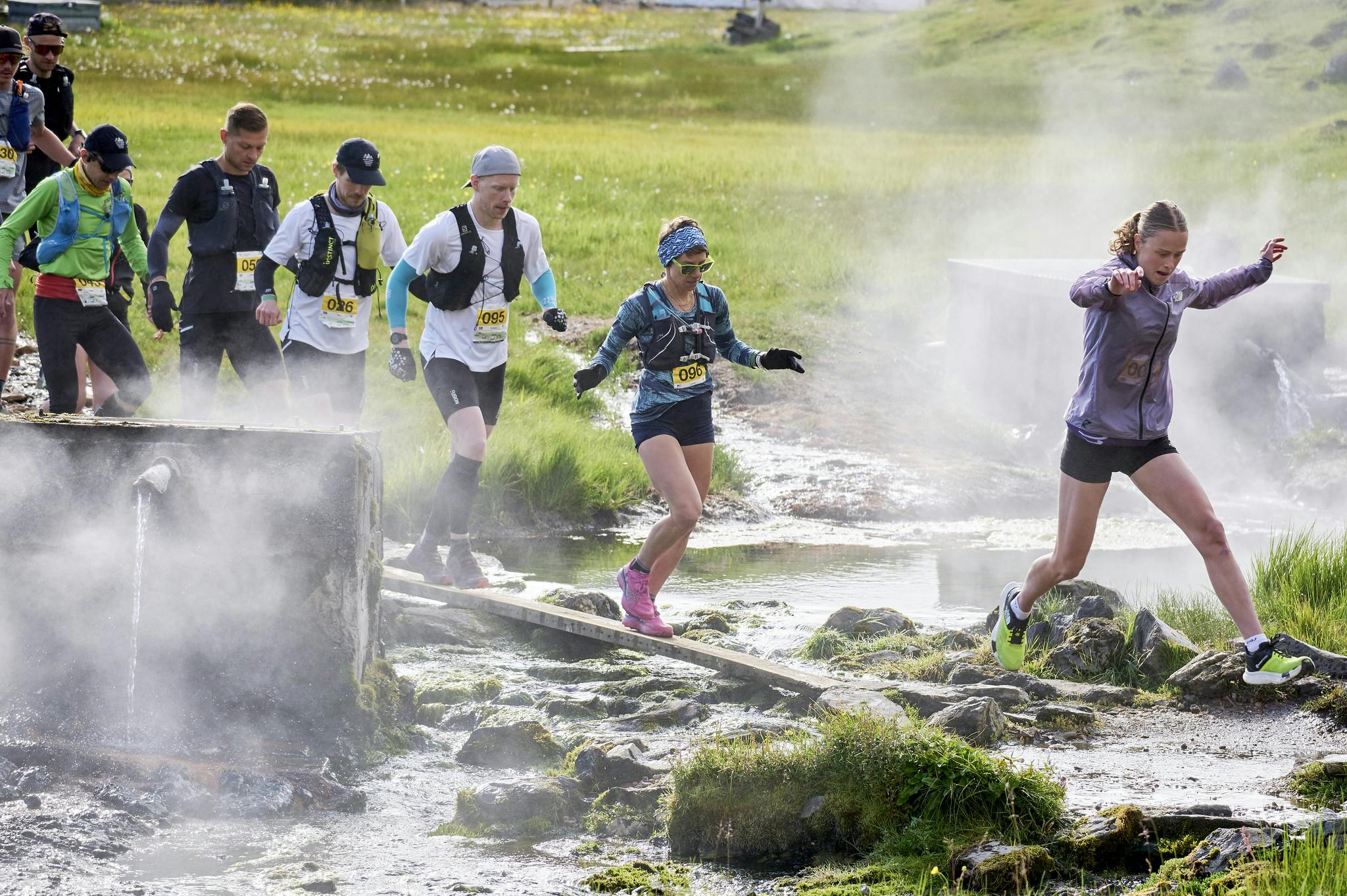 Runners must navigate through a hot spring at the start of the Laugavegur Ultra Marathon. Photo: Anton Brink