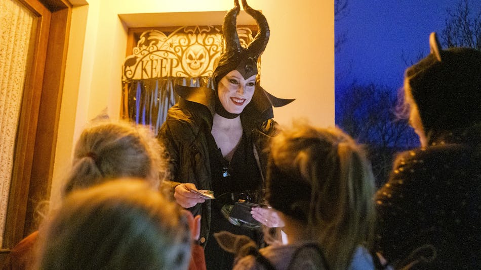 Trick-or-treaters going door to door on Halloween in Iceland.