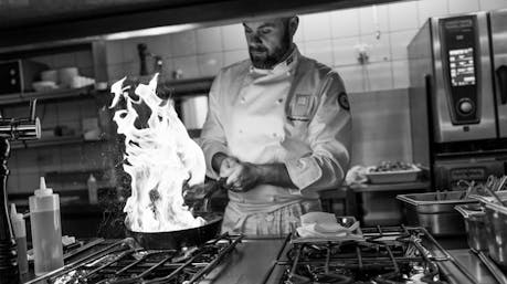 Chef Haflidi Halldorsson preparing a meal.