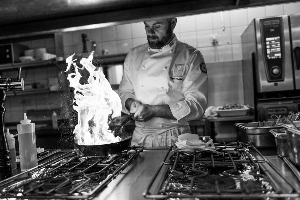 Chef Haflidi Halldorsson preparing a meal.