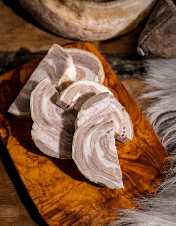 Lundabaggar is a classic Þorrablót dish served fresh, or sour. It is the intestines, cut lengthwise, fillets of neck meat packed into the intestines with a bit of salt. Then wrap it all in the sheep's diaphragm.