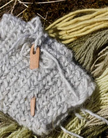 Close-up picture of traditional Viking woolen and knitting techniques.