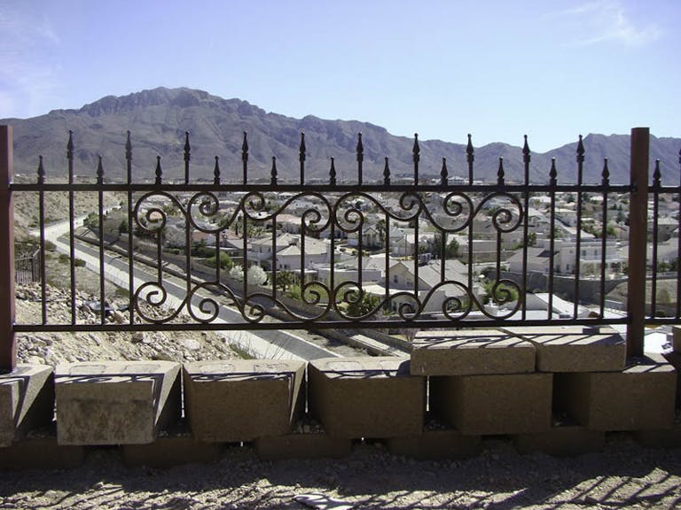 New Mexico Steel Fabricators Inc. Iron Fence