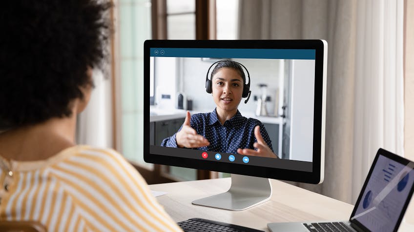 employee getting support from a virtual coach
