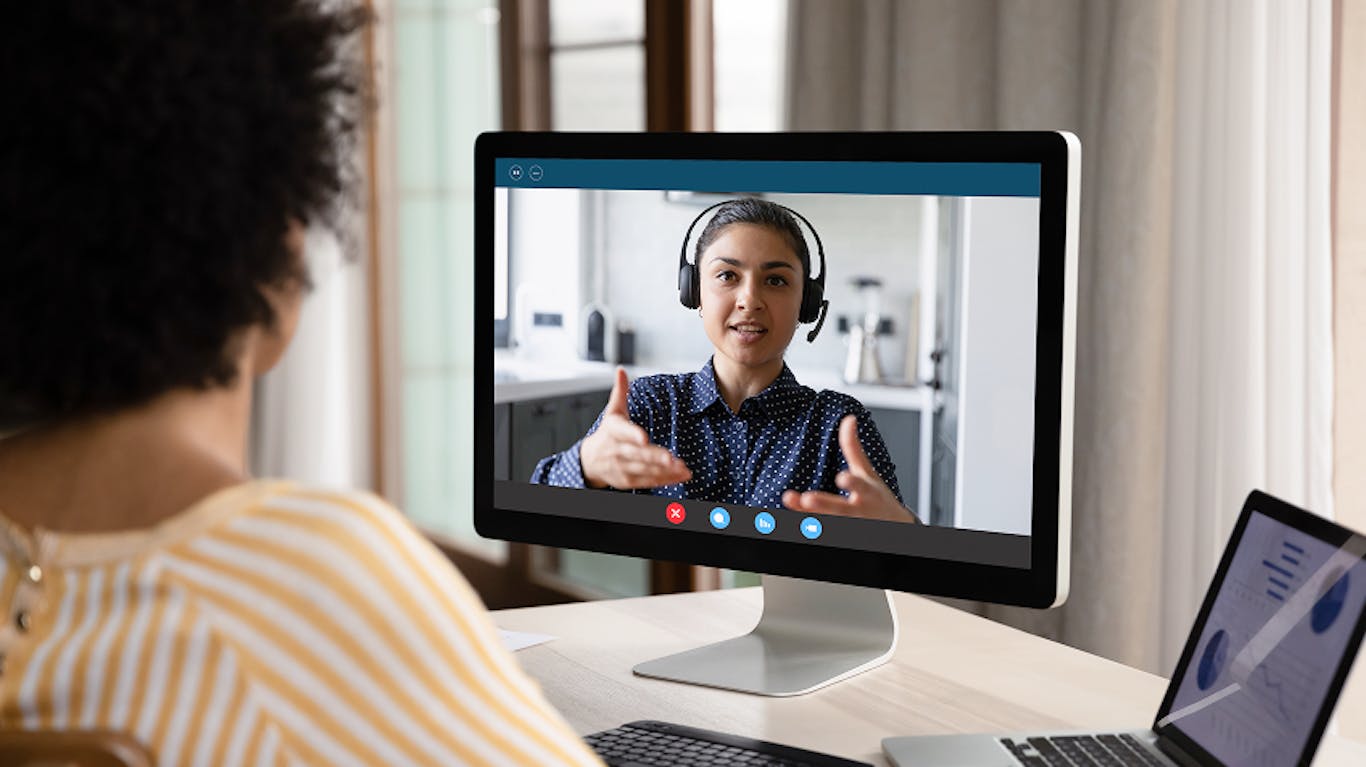 employee getting support from a virtual coach