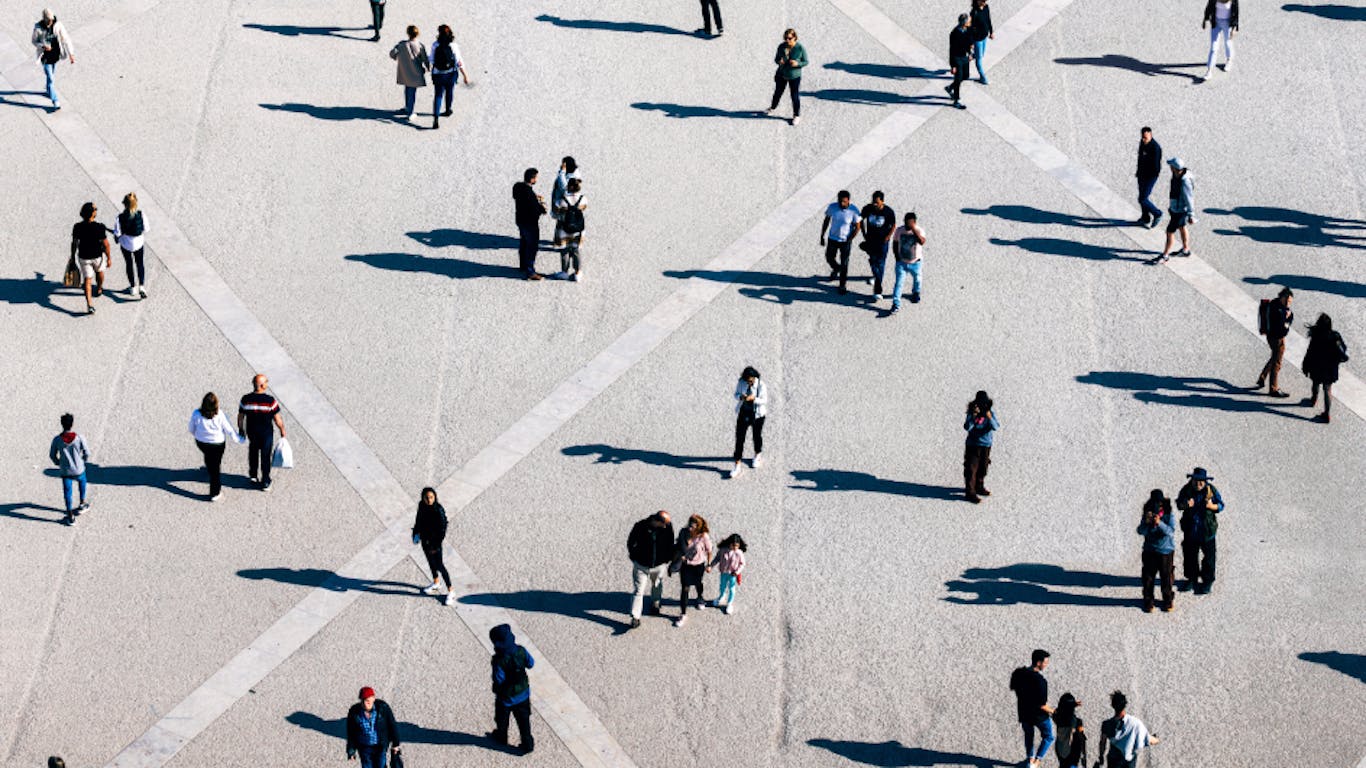 birds-eye view of people walking 