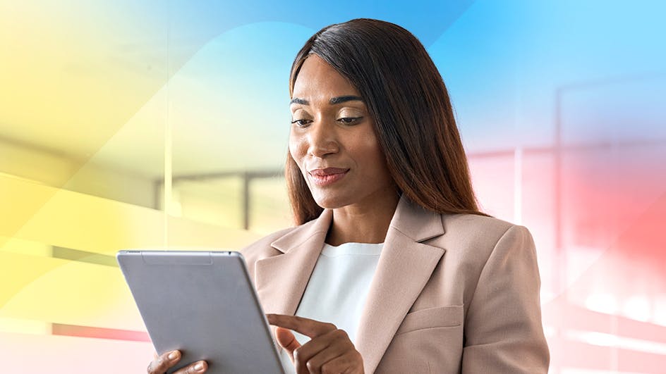 blog header image depicting a woman holding a tablet