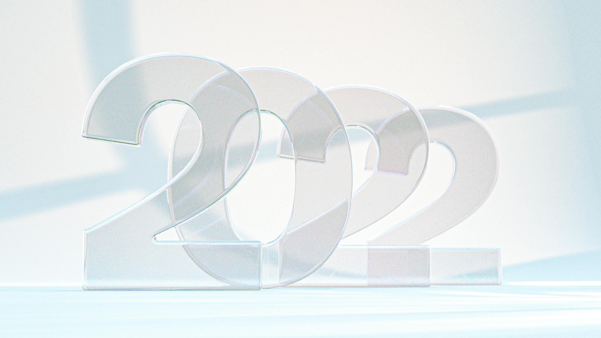 Letters made of transparent glass that read "2022"