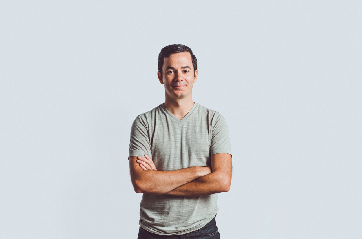 A headshot of Jason King