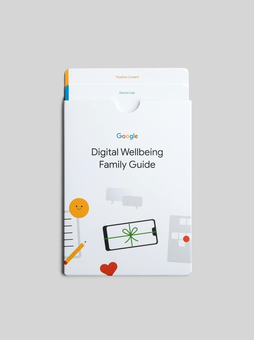 Two thick sheets of cardstock enclosed within a dust jacket titled "Digital Wellbeing Family Guide".