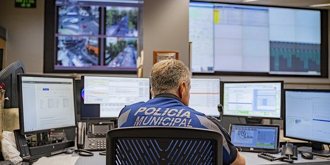 A police men from Madrid, in front of computers