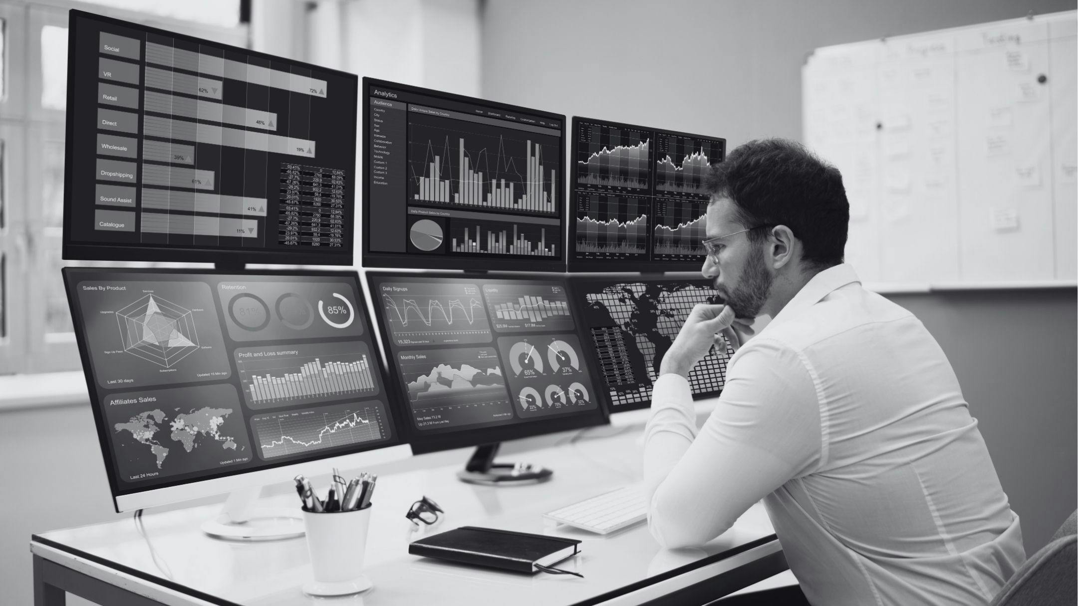 image depicting a person at work trading stocks