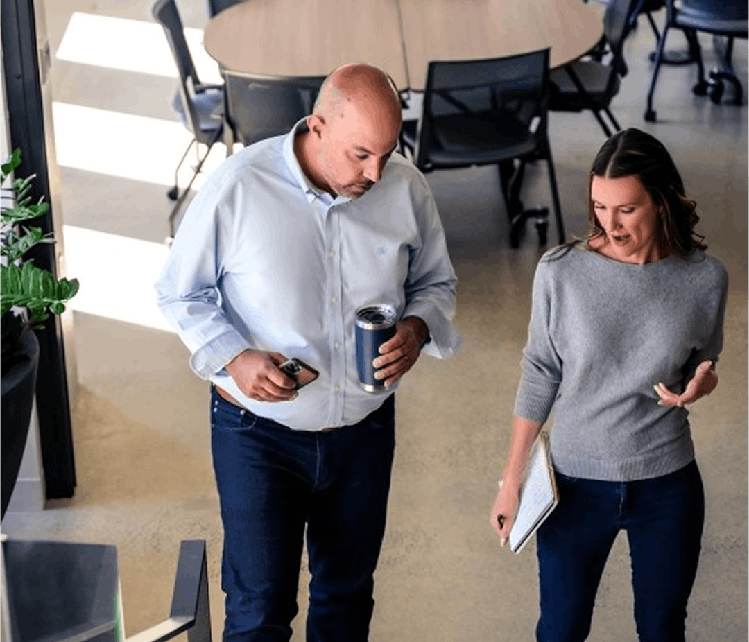 Two people in office