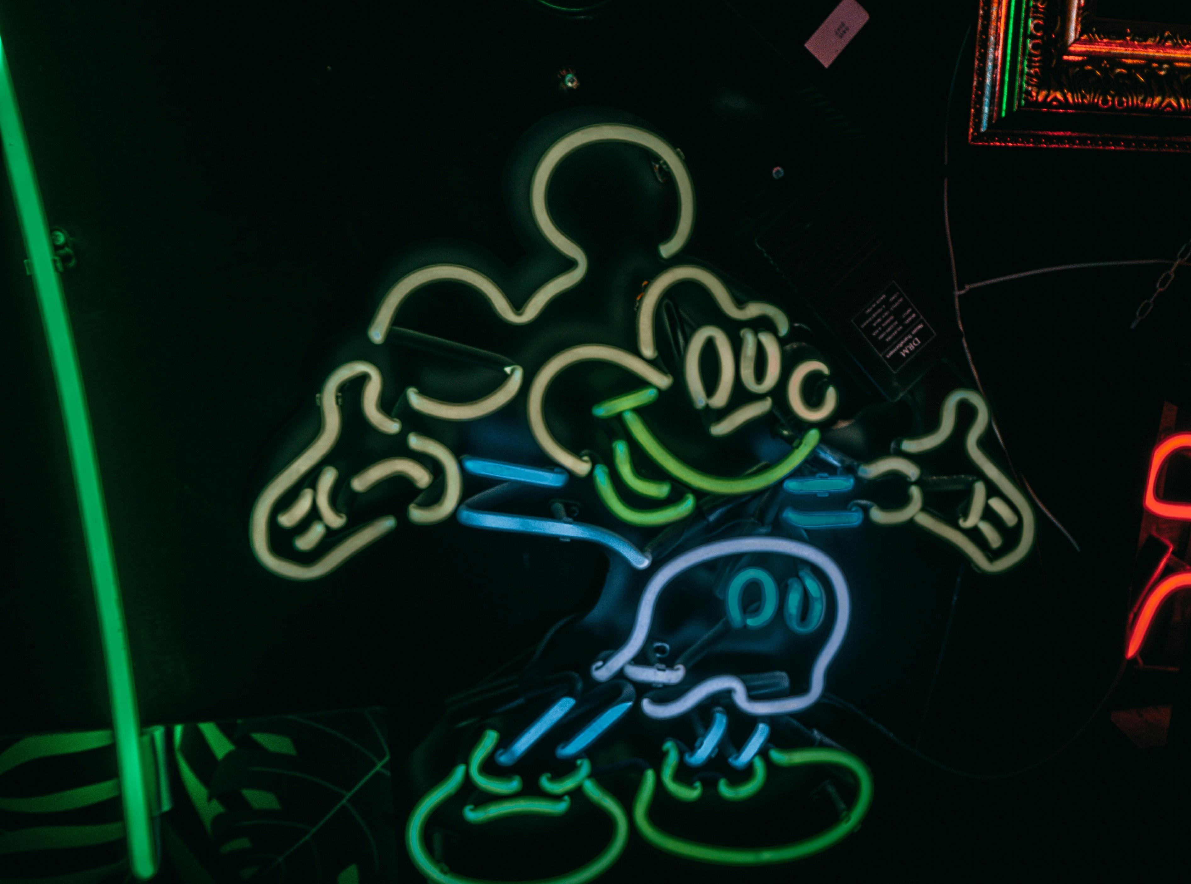 A neon version of Mickey Mouse, the ultimate transmedia franchise by the ultimate transmedia company