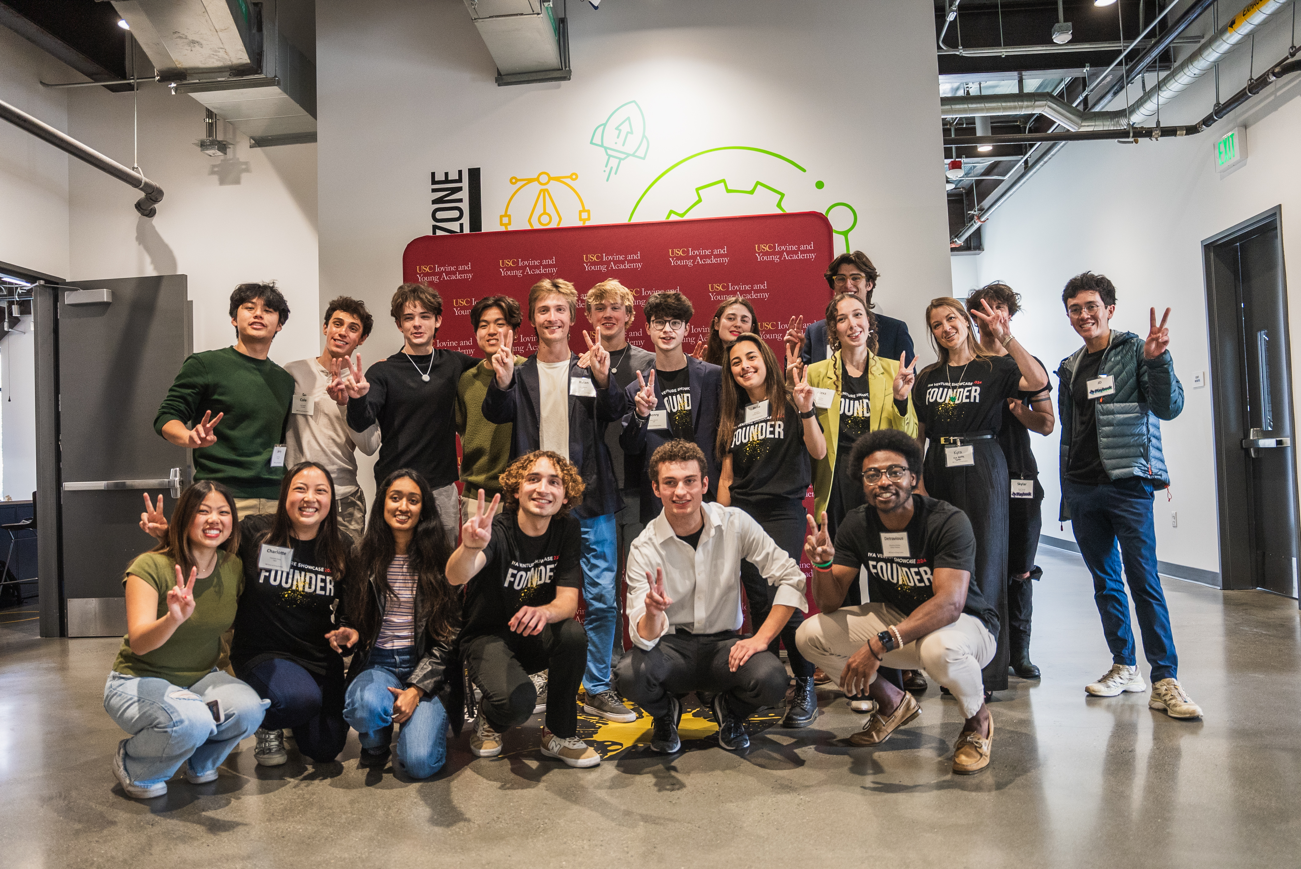 students with fight on hand gesture 