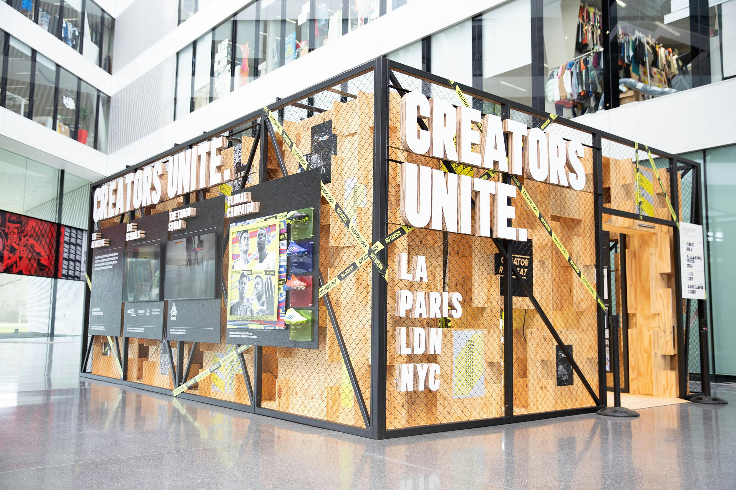 Large indoor installation with sign Creators Unite