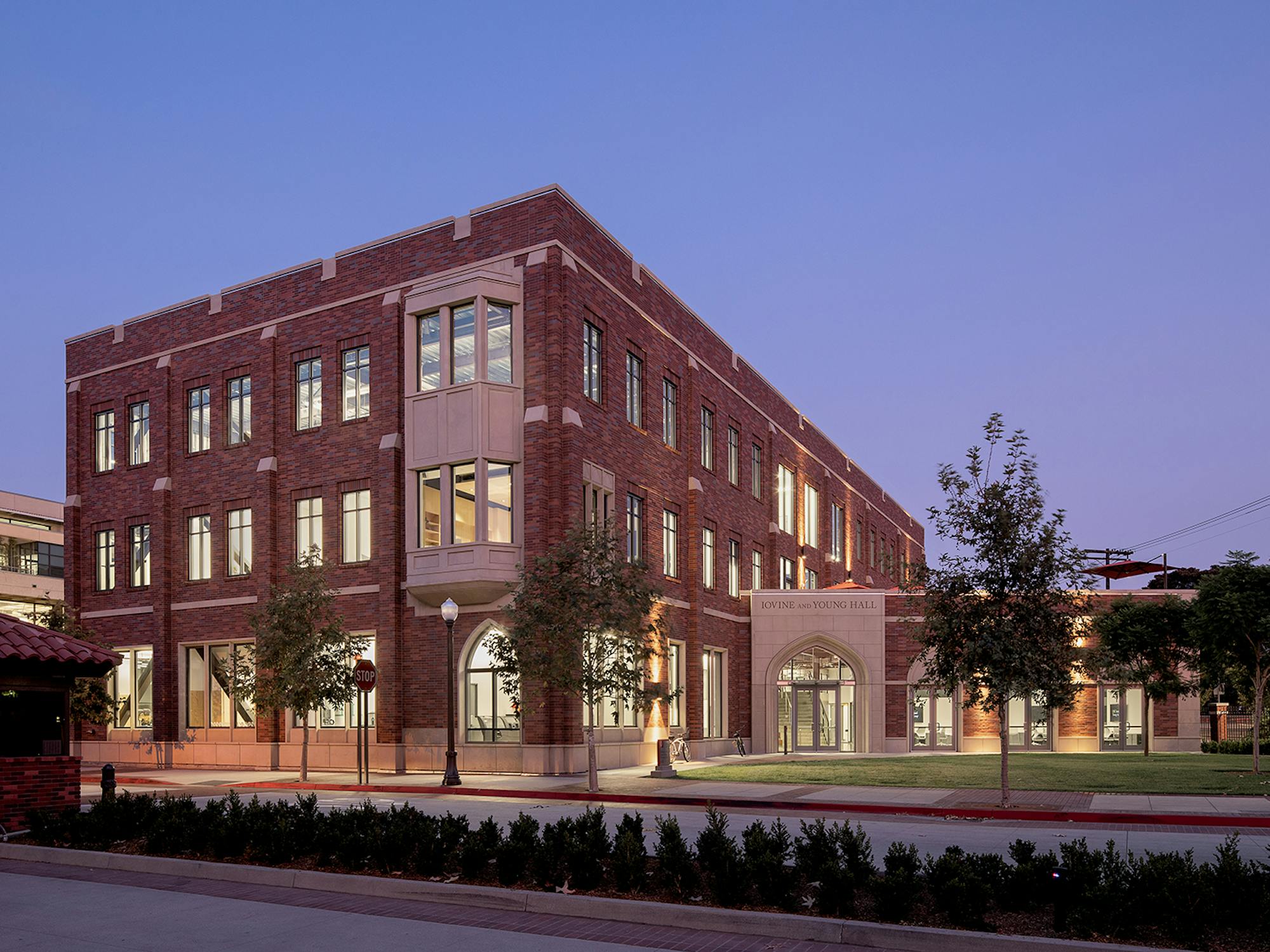 Red brick building lit up at night